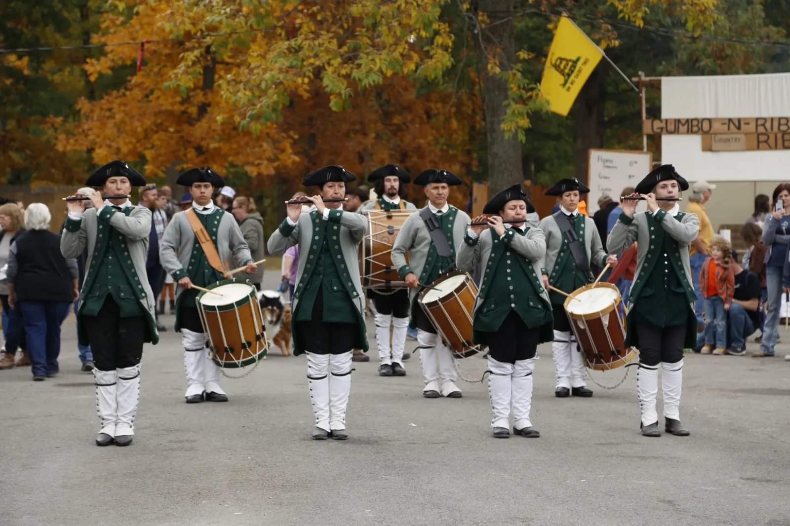 Soldiers marching and playing instruments at Fort Massac Encampment
